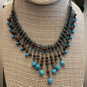 Very cool wood an bead necklace Artisan made 17” adjust boho hippie just cool!